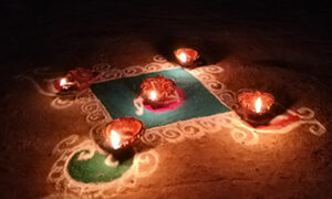 Lamps on rangoli during Diwali Festival