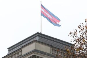 Transgender flag on the roof of a building