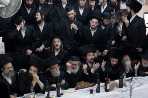 Orthodox Jewish men at a Purim tish at Bnei Brak