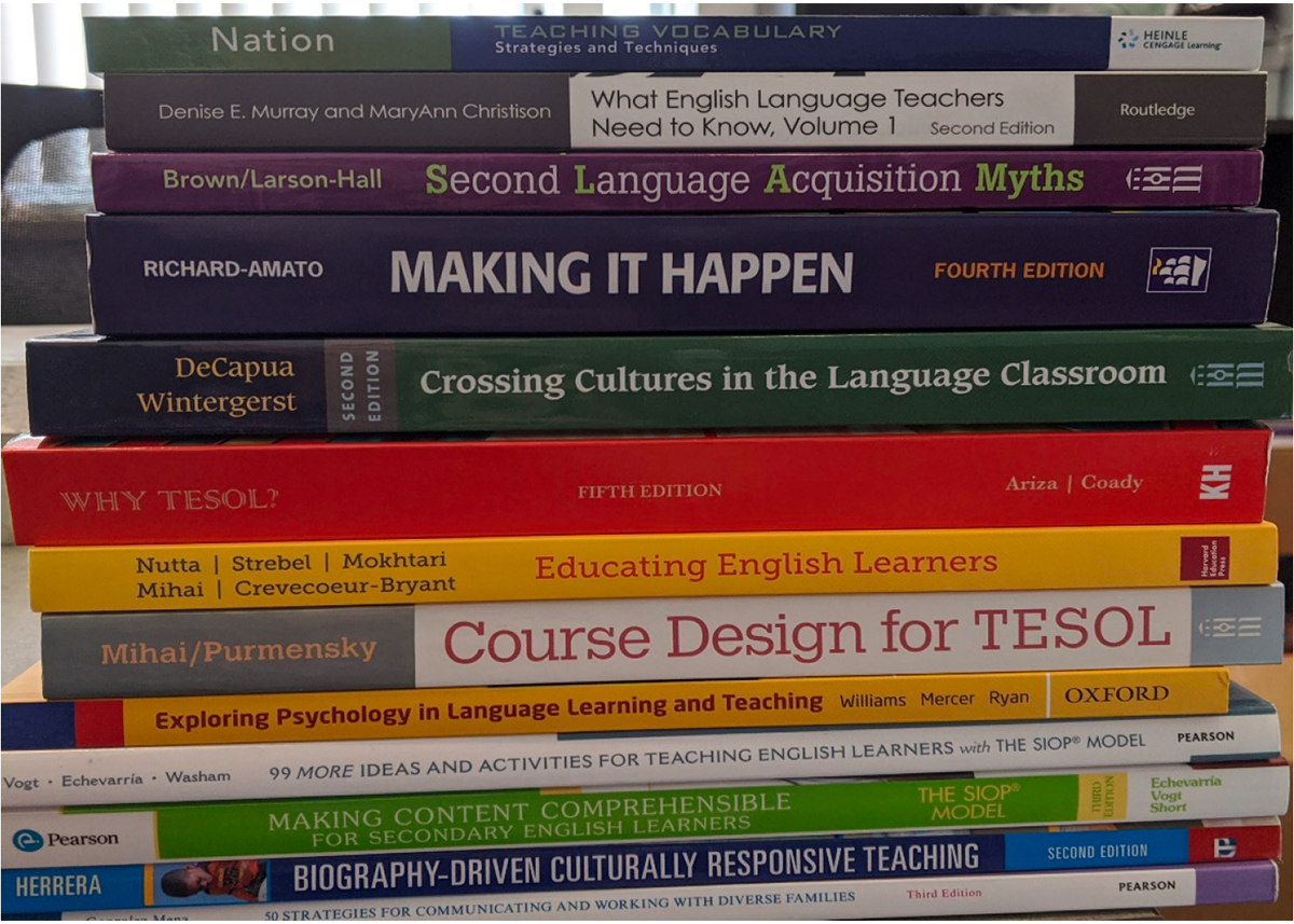 Photo of a stack of textbooks (Photo Credit: iELT-Ozarks Project)