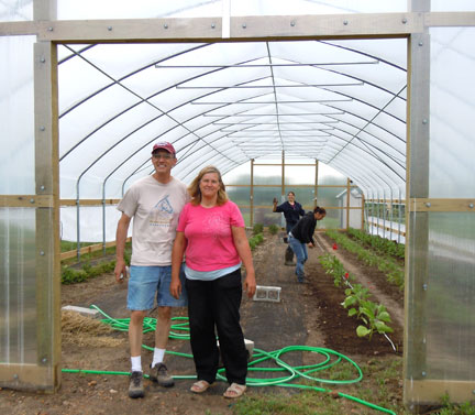 Dr. Martin Kaps and Susanne Howard are managing the vegetable crops in the tunnel