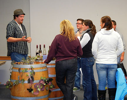 Josh Glasson, a graduate student with an emphasis in enology,  discusses the wines with our guests.