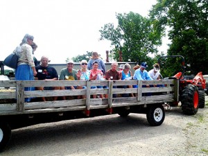 The hay wagon transported the group to the pavilion for the panel discussion lunch and later to the high tunnel.