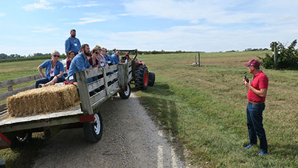 Dr. Martin Kaps and Susanne Howard lead the field tour with Jeremy Emery and Randy Stout driving the wagons.
