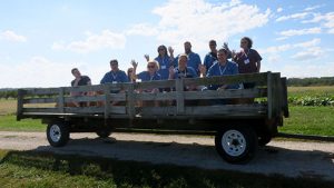 The USA Staff Ambassadors had a beautiful day for the hay ride to see the research and demonstration plantings in the field.