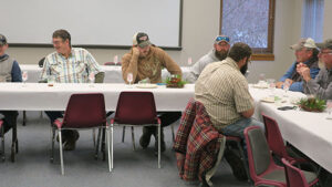 The ranch personnel enjoyed the meal. (photo by C. J. Odneal)