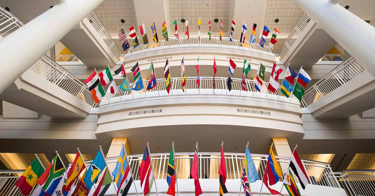 International flags along the floors of Strong Hall.