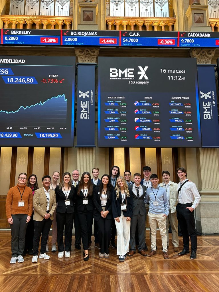 Students stand at La Bolsa de Madrid (Stock Exchange) in Madrid, Spain