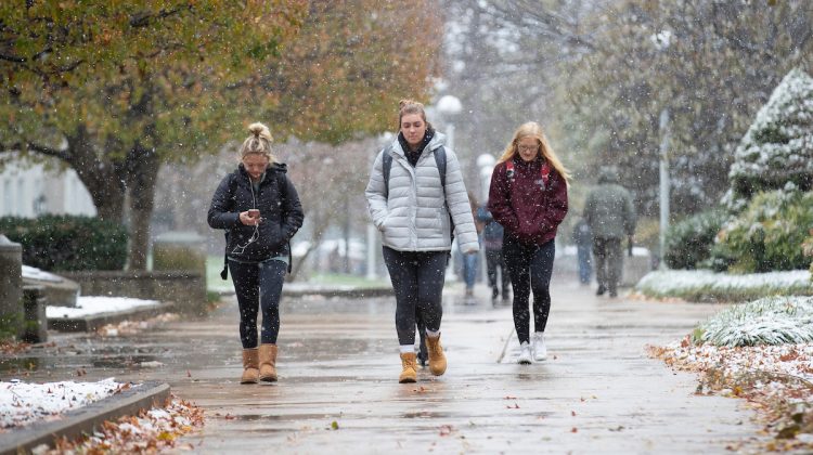 Students walking on a snowy campus