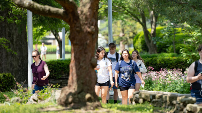 Students walk on campus during international student orientation.