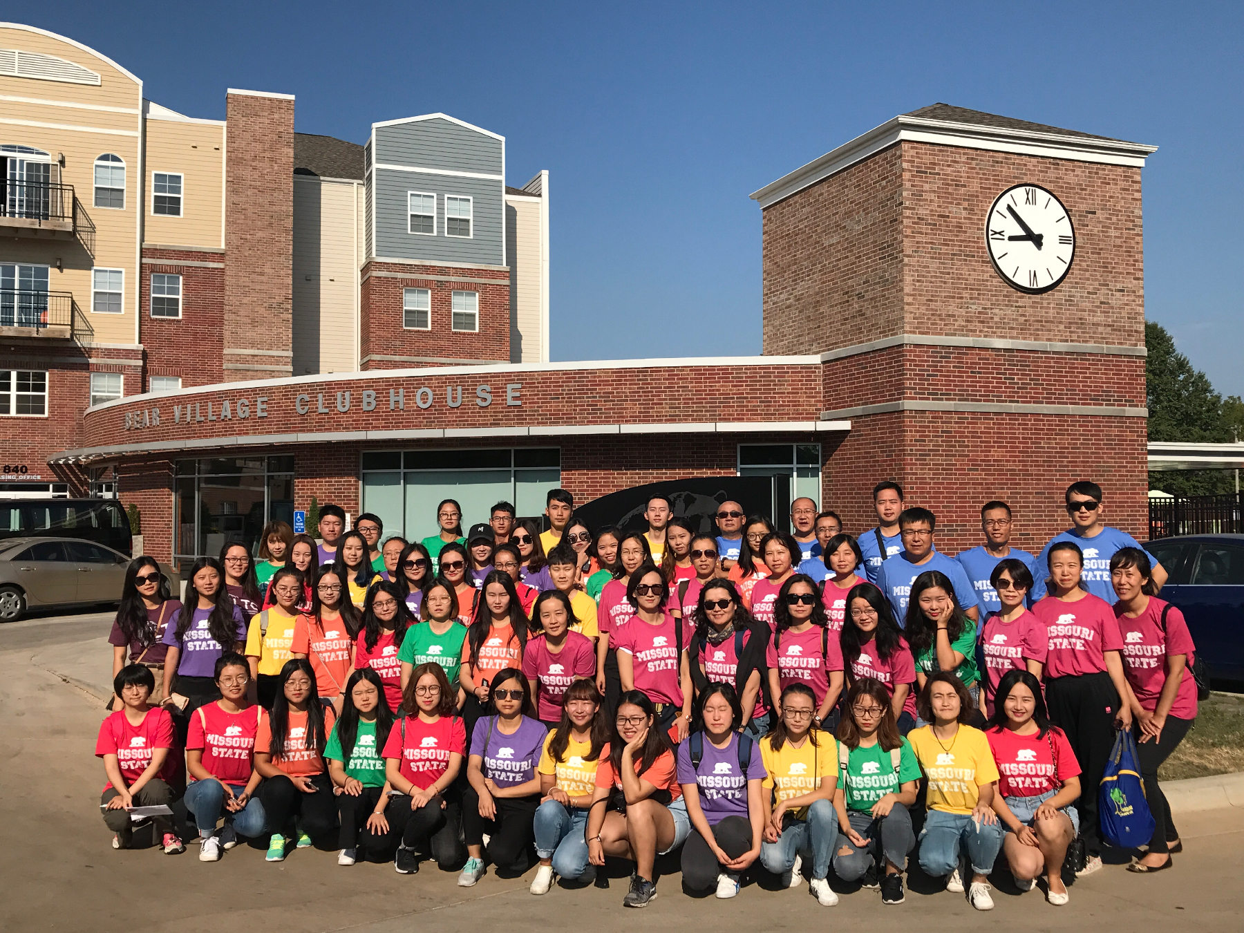 Ningxia University students and faculty pose in front of their new home, Bear Village.