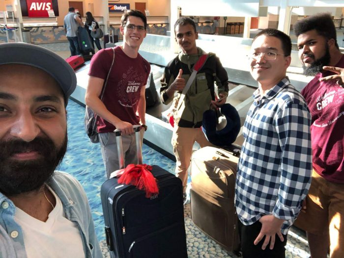 Global Leaders and Mentors picking up a new international student at the airport.