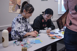 Image of students doing crafts