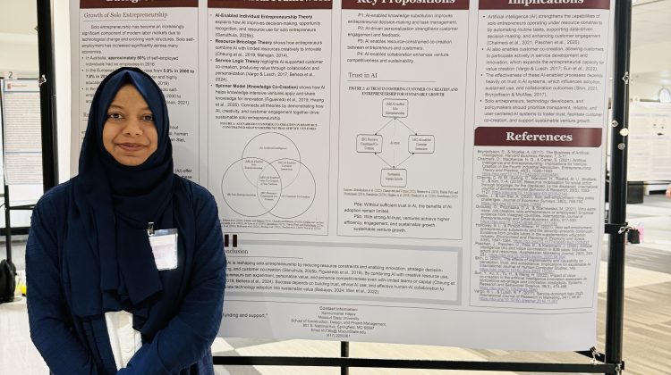 Kamrunnahar Happy presenting AI solo entrepreneurship research poster at Missouri State University forum.