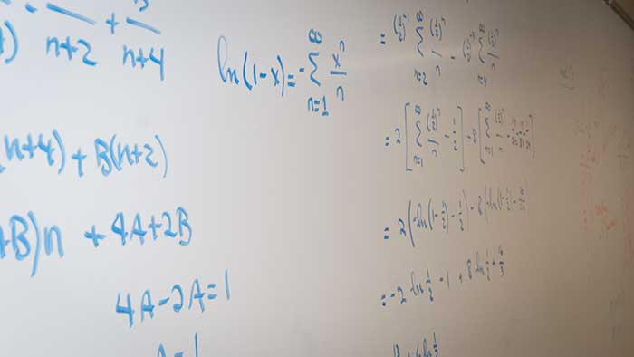 Math problem shared on whiteboard