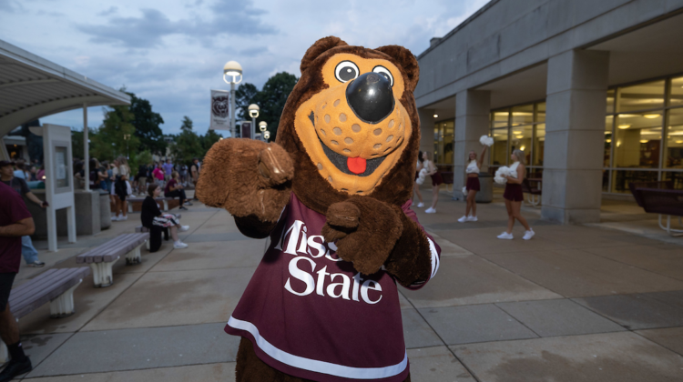 Boomer in front of the Plaster Student Union