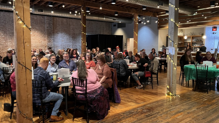 Community members gathered in support of PHP during a fundraising event