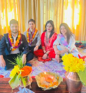 Ghimire with his sisters and cousins at a family program.