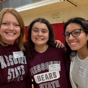Murray, left, shares a moment with nutrition and dietetics students