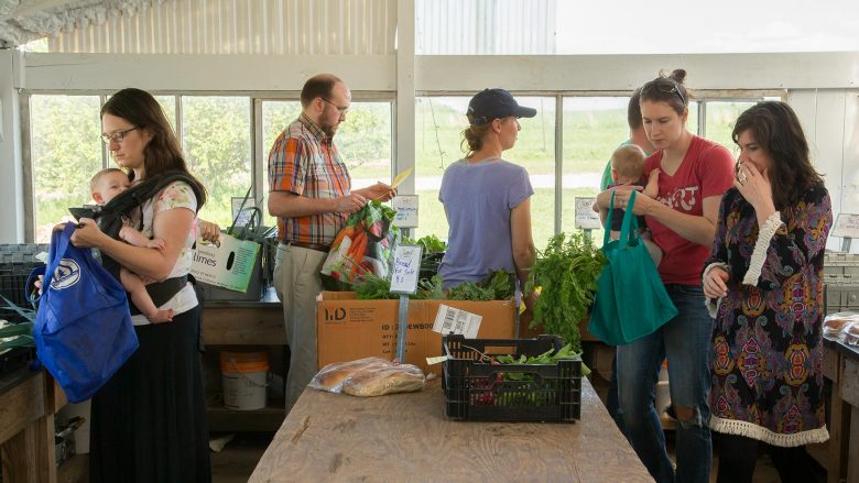 Customers pick up fresh produce