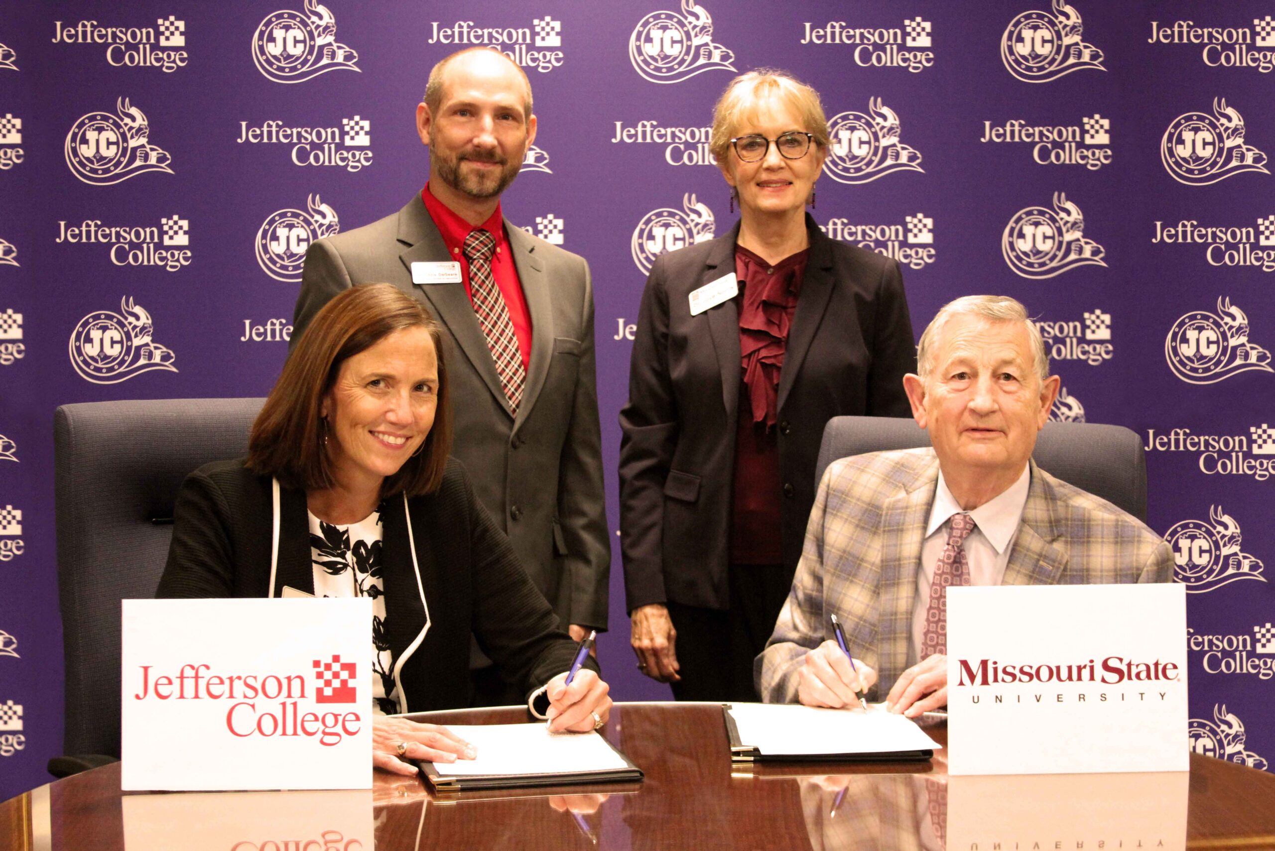 Representatives from Jefferson College and Missouri State University smile at the camera after signing an articulation agreement on the campus of Jefferson College. 