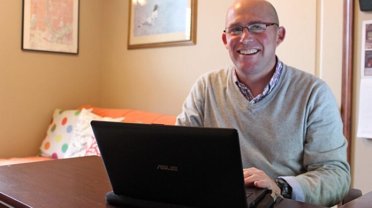 Adult man using a laptop