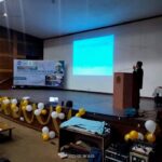 Dr. Kartik Ghosh giving a presentation.