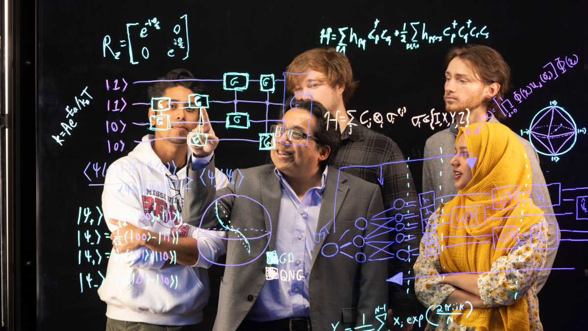 Dr. Ridwan Sakidja (center), Missouri State University professor of physics, astronomy and materials science, with students from his research group (including Gaige Riggs on his right), spearhead a project on quantum circuit designs.