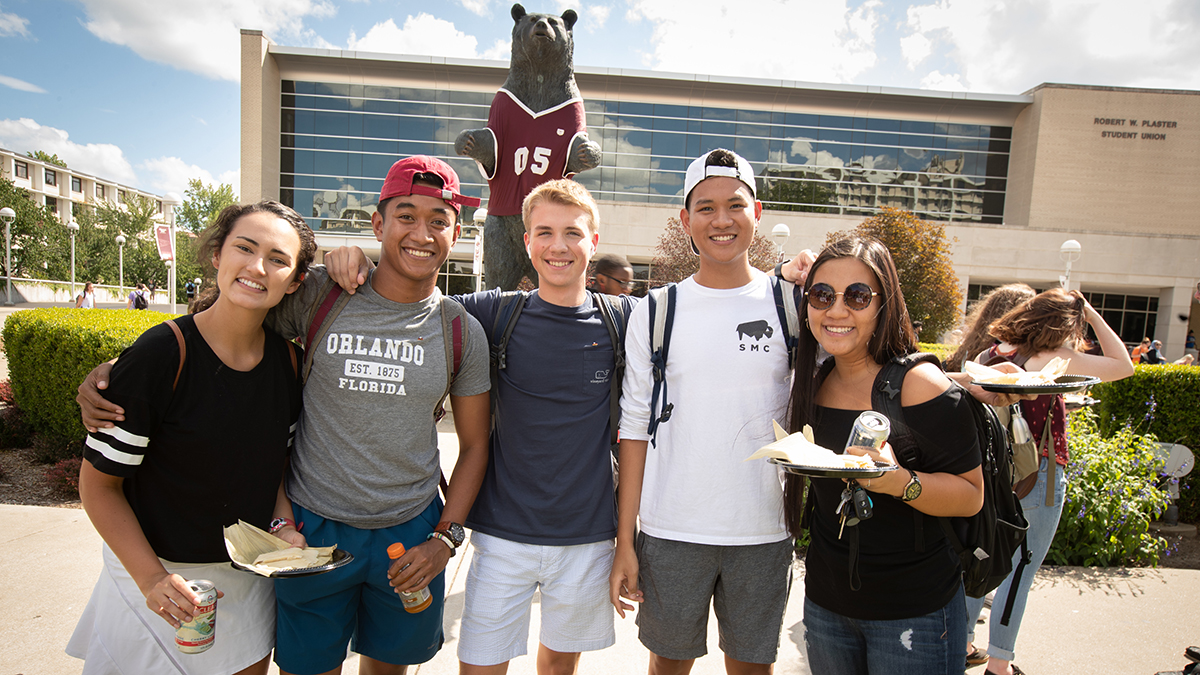 Students pose with tamales at 2018 Latinx Heritage Month Kickoff