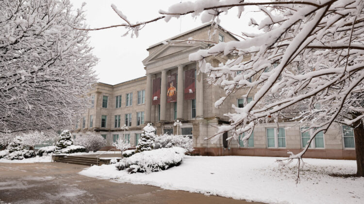 Snow covers Carrington Hall.