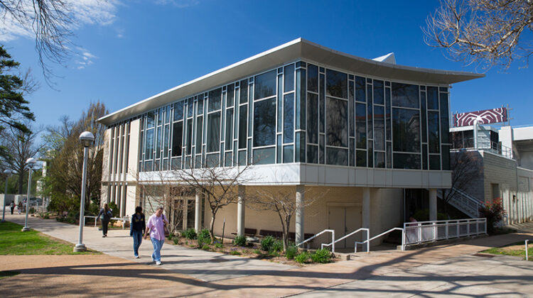 The exterior of Karls Hall on campus.