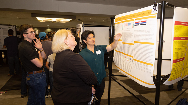 A College of Natural and Applied Sciences (CNAS) student shares his research at the 2025 CNAS Undergraduate Research Symposium.