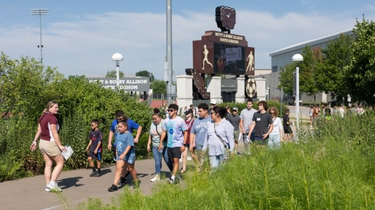 A summer campus tour in progress.