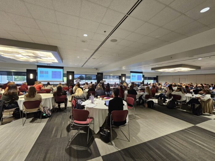 A full room of School of Accountancy students listening to a speaker at the IMA Heartland Council Education Conference
