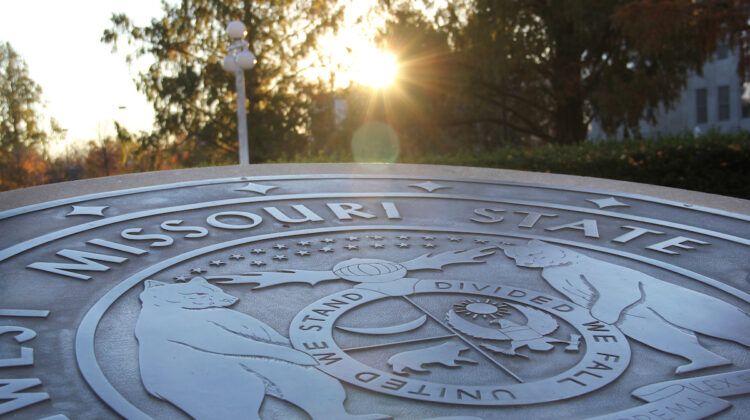 Close-up of the Missouri State University seal, at sunrise