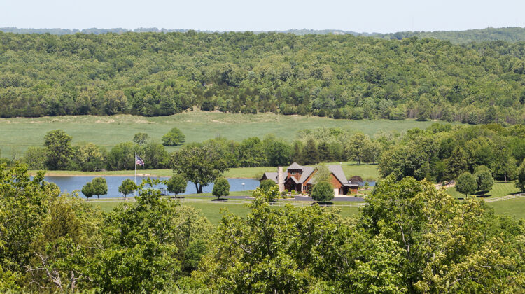 Long lens view of Journagan Ranch, with the pond and the ranch house in the center of the frame