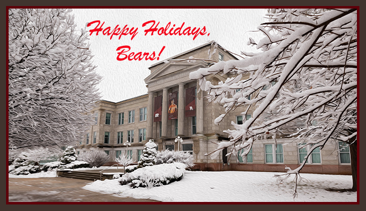 The exterior of Missouri State University's Carrington Hall on a snowy, winter day. The words "Happy Holidays, Bears!" are written across the top of the photo.