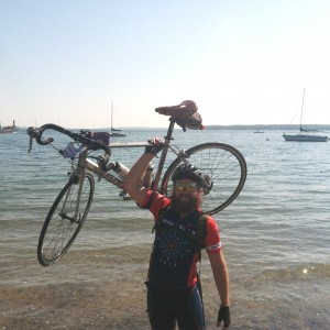 Matt Hartman at the beach during his Bike and Build journey