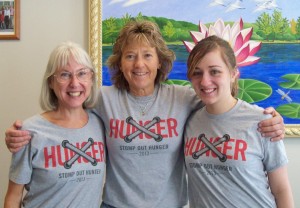 Religious Studies employees showing off our "Stomp Out Hunger" t-shirts.  From left: Jane Terry (REL Administrative Assistant), Lora Hobbs (REL Senior Instructor), and Samantha Nichols (REL Student Worker and Lora's assistant).