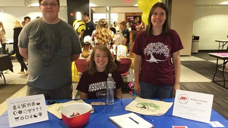 photo of Religious Studies club members Connor, Brooke, and Katherine, at the New Student Festival