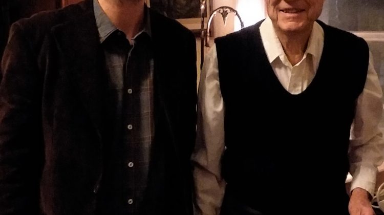 Photo of Religious Studies Assistant Professor Dr. Vadim Putzu with Tom Johnson, grandson of Thomas Moore Johnson