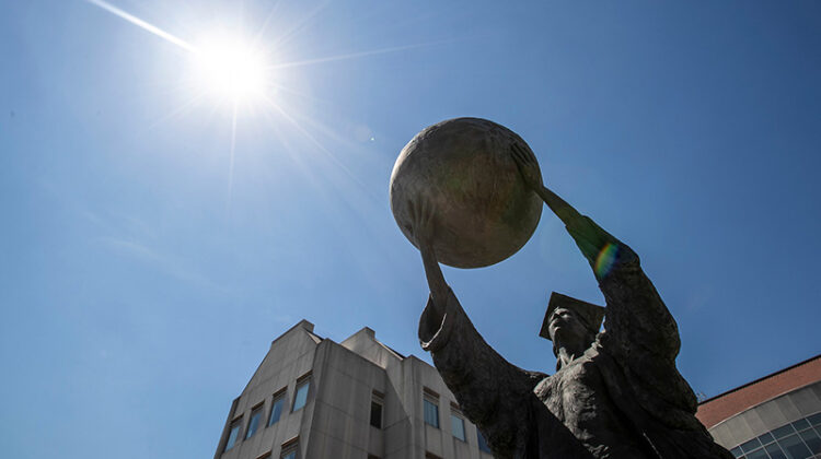 Citizen Scholar statue at Missouri State University reaches toward sun