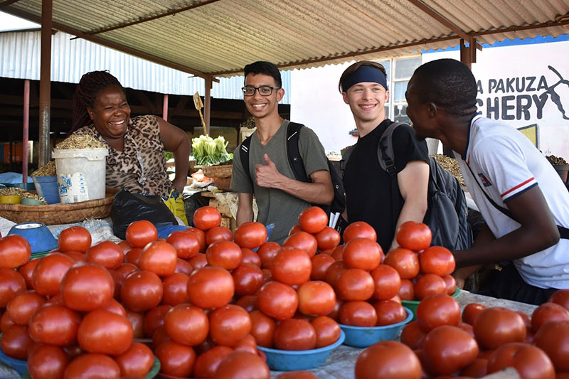 Group at tomato stand