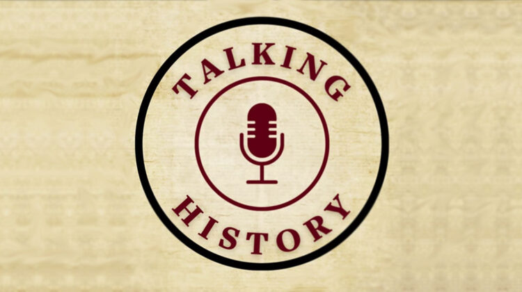 Light wood grain background graphic with "Talking History" text