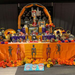Day of the Dead display in bright orange colors