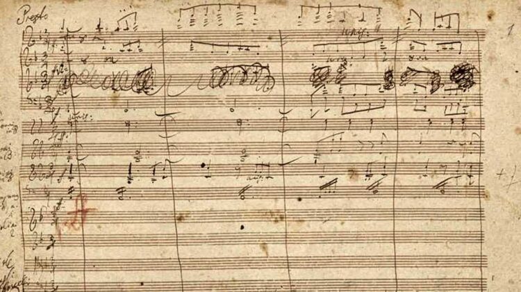 Original music sheet notes from Beethoven's Ninth Symphony