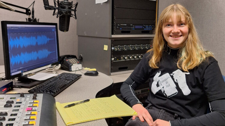 Student sets at radio desk