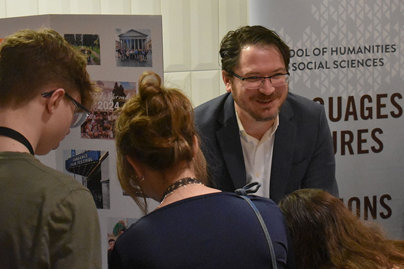 Dr. Bryan Brinkman visits with students