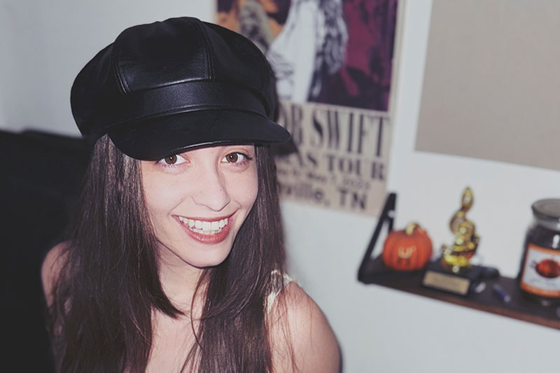 Young woman in hat