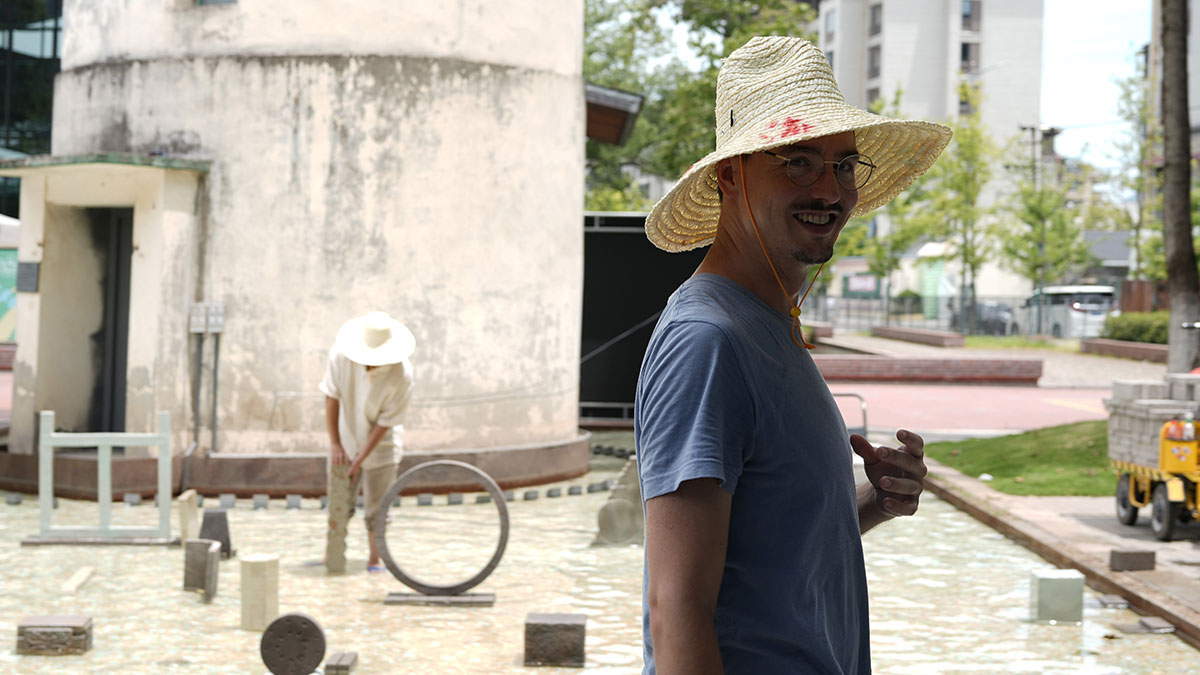 Male artist working outside